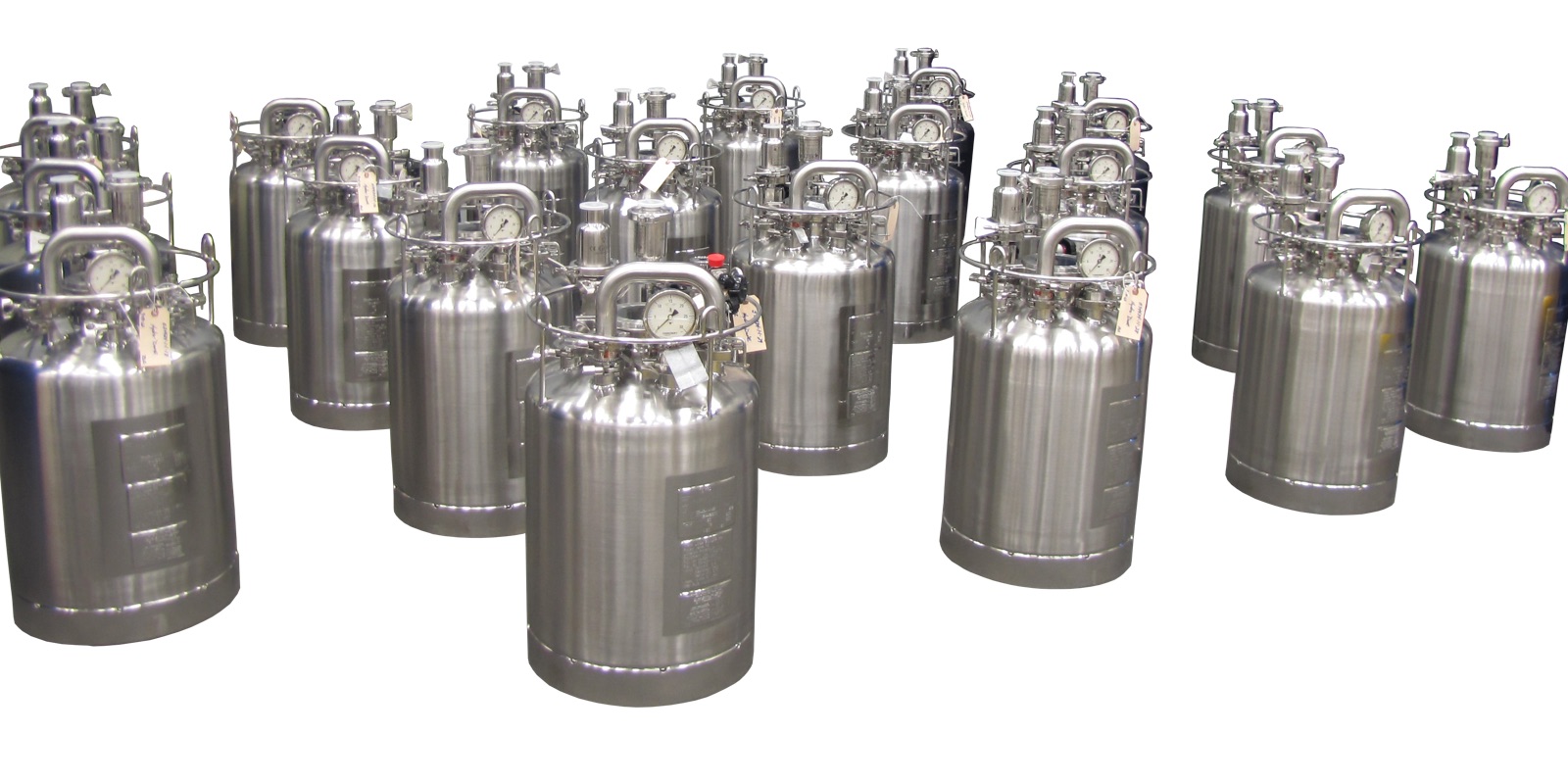 a group of mechanically polished tanks with pressure valves.
